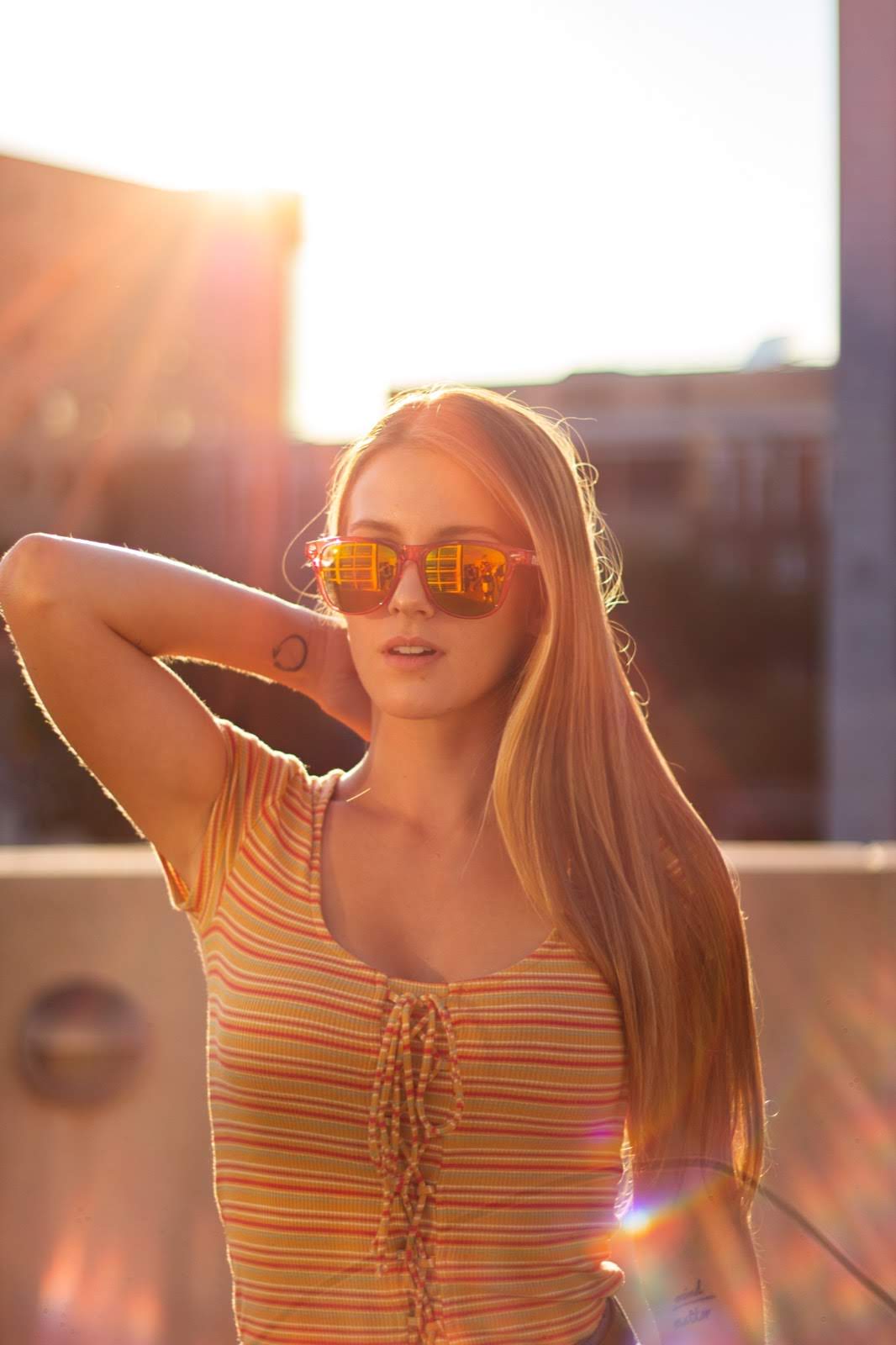 Women Posing with Sunglasses